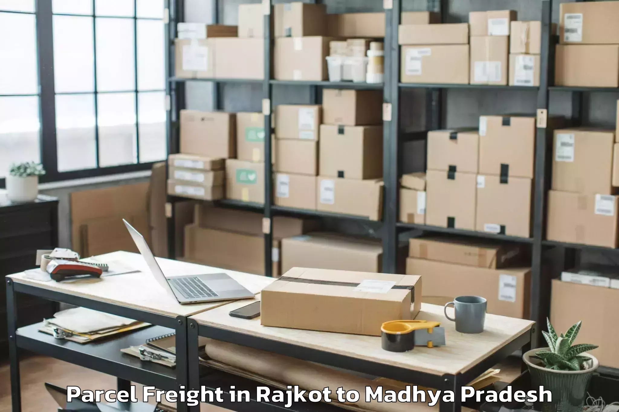 Book Rajkot to Garh Parcel Freight Online